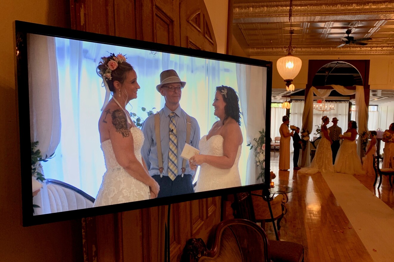 Glenn Hartong, co-owner of Chilidog Pictures, recently streamed the wedding of Lenora Combs (left) and Sarah Strickland (right) at The Turn In Newport. 